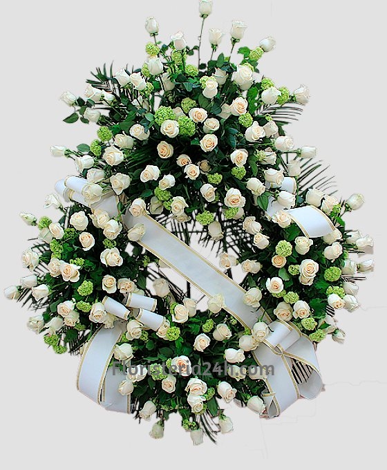 Corona para difuntos compuesto de rosas blancas